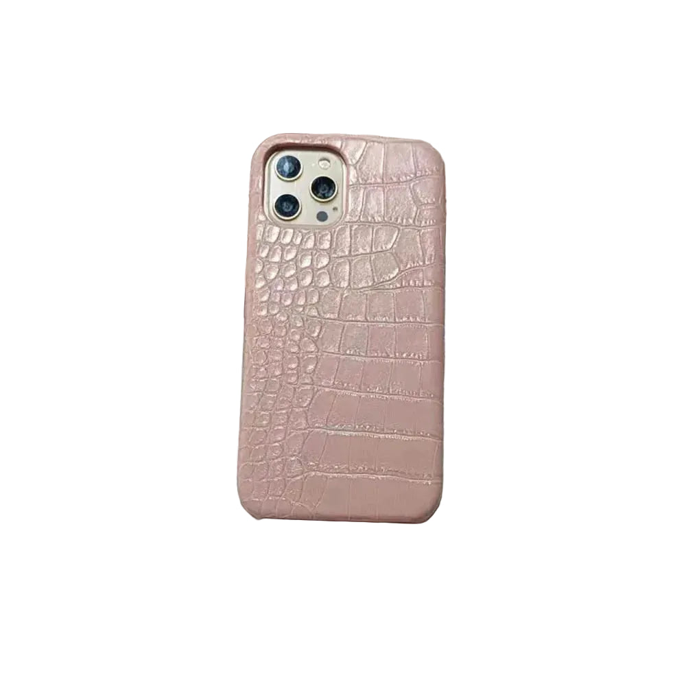 Pink crocodile texture phone case on a newspaper background
